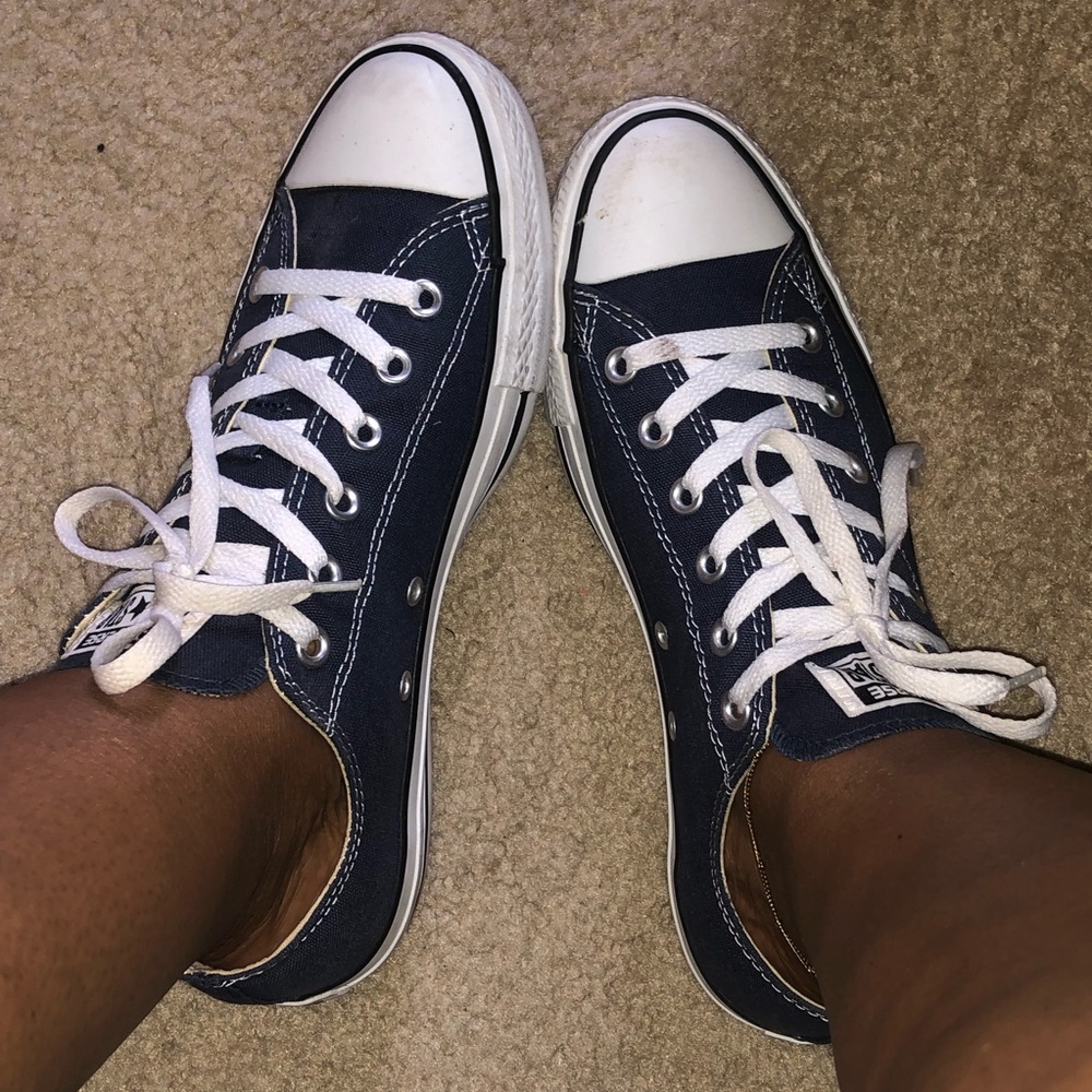 Navy Converse sneakers.